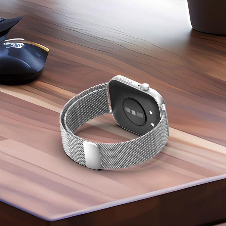 Silver Milanese metal watch band attached to a smartwatch, shown from the back