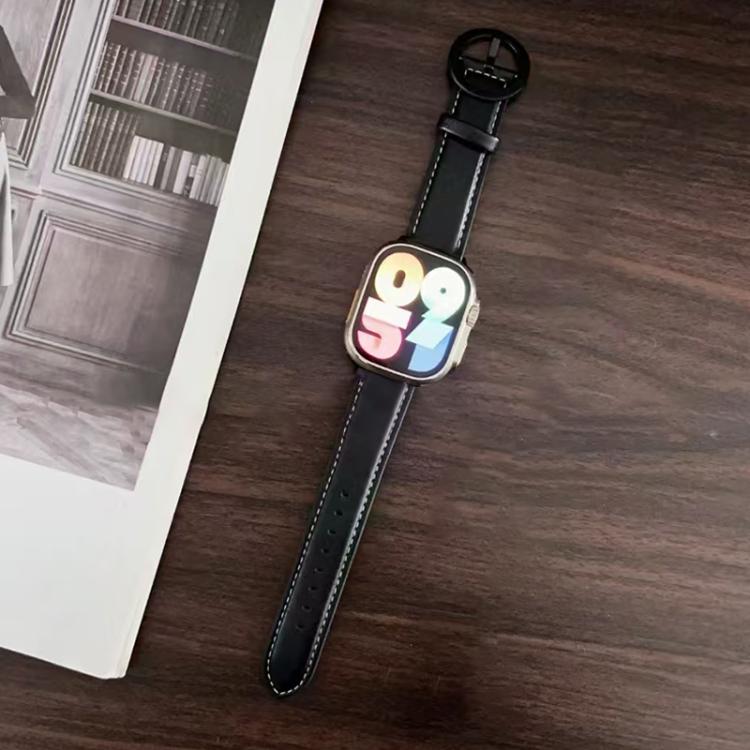Black leather Apple Watch band with white stitching and round buckle, shown on a watch