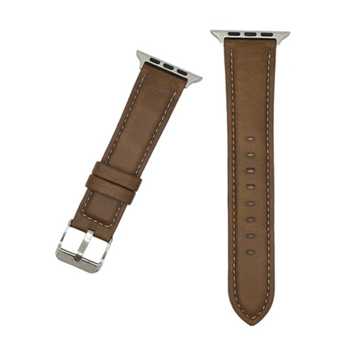 Brown Crazy Horse leather watch band with white stitching, silver buckle, and adjustment holes.
