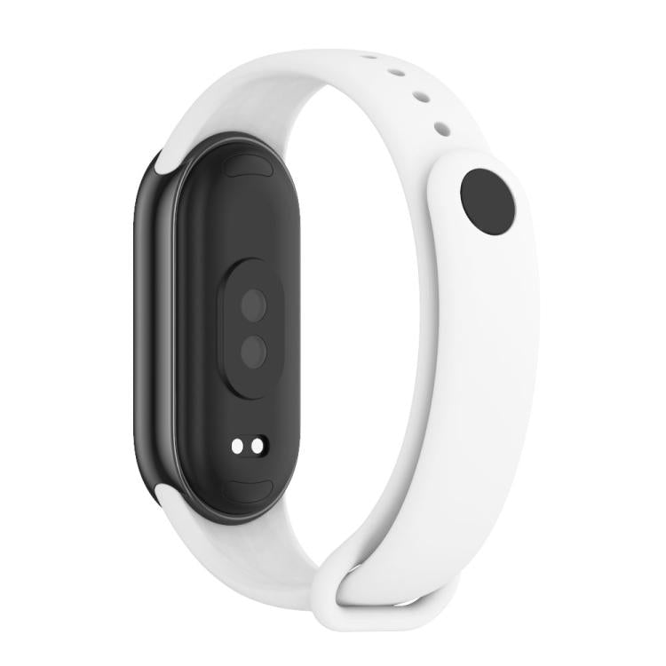 White silicone watch band with adjustment holes and a metal buckle, shown with tracker underside