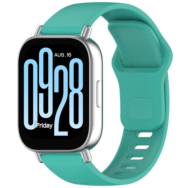 Mint green silicone watch band with reverse buckle, shown on a smartwatch