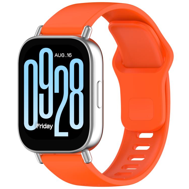 Orange silicone watch band with reverse buckle, shown on a smartwatch