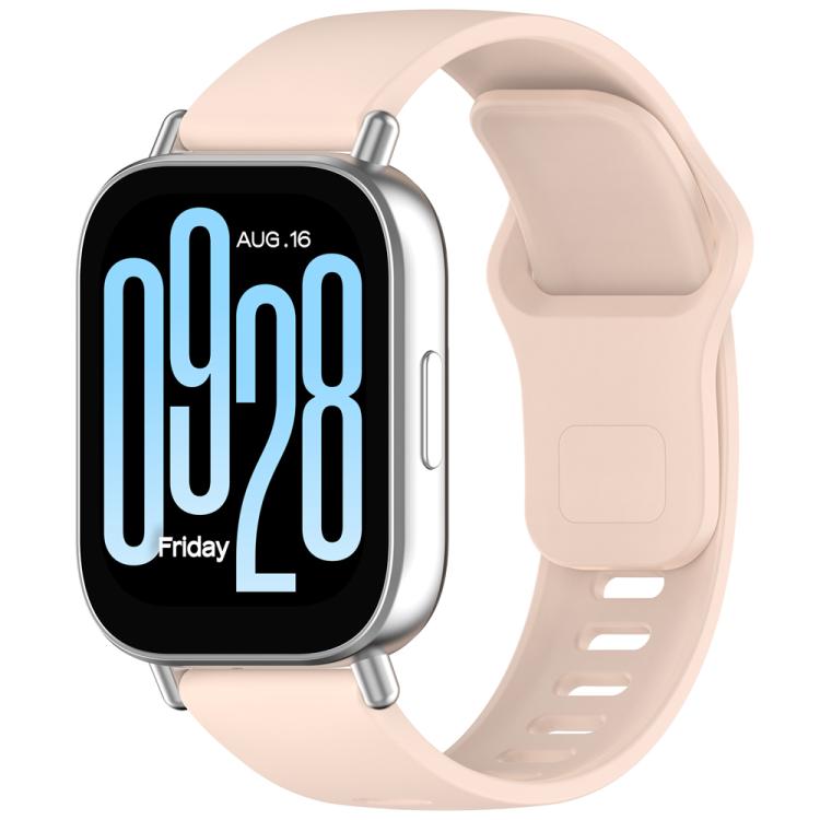 Pale pink silicone watch band with reverse buckle, shown attached to a smartwatch.