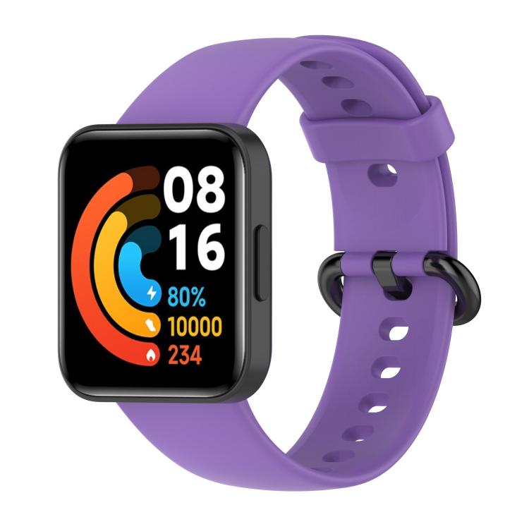 Purple silicone watch band with a black smartwatch attached.