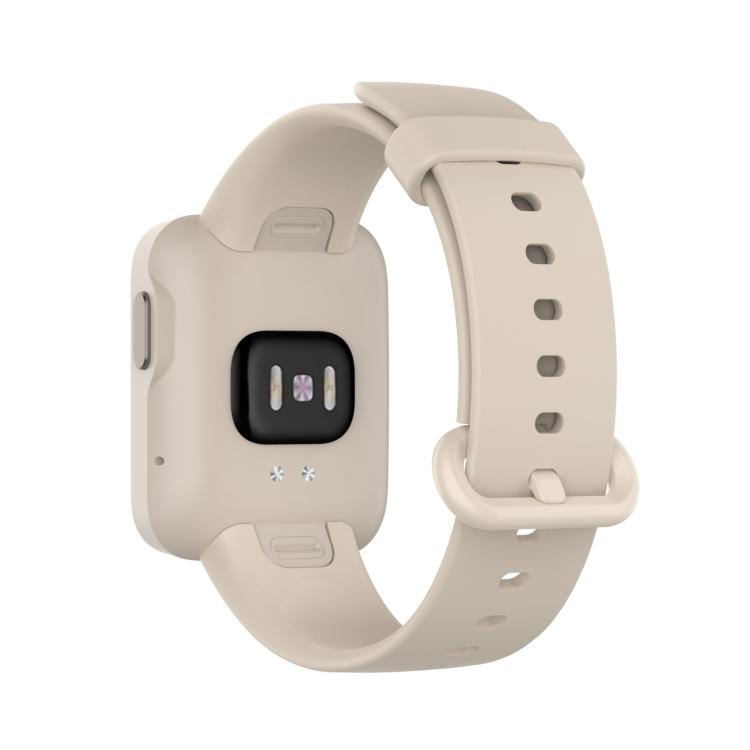 Ivory silicone watch band fitted to a smartwatch, shown from the back.