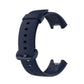 Navy silicone watch band with adjustment holes, buckle, and strap loop.