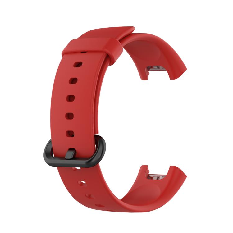 Red silicone watch band with adjustment holes and dark buckle