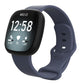 Fitbit smartwatch with a slate blue silicone band and adjustable buckle