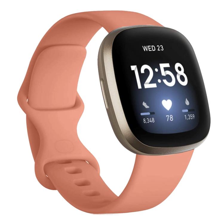 Coral pink smartwatch band with a curved silicone strap and sizing holes