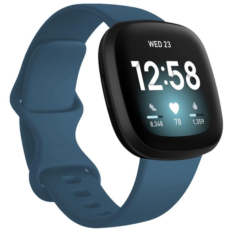 Blue smartwatch band with a curved silicone strap and sizing holes