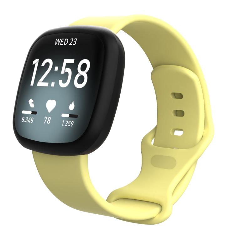Fitbit-compatible silicone watch band in pale yellow, shown attached to a smartwatch.