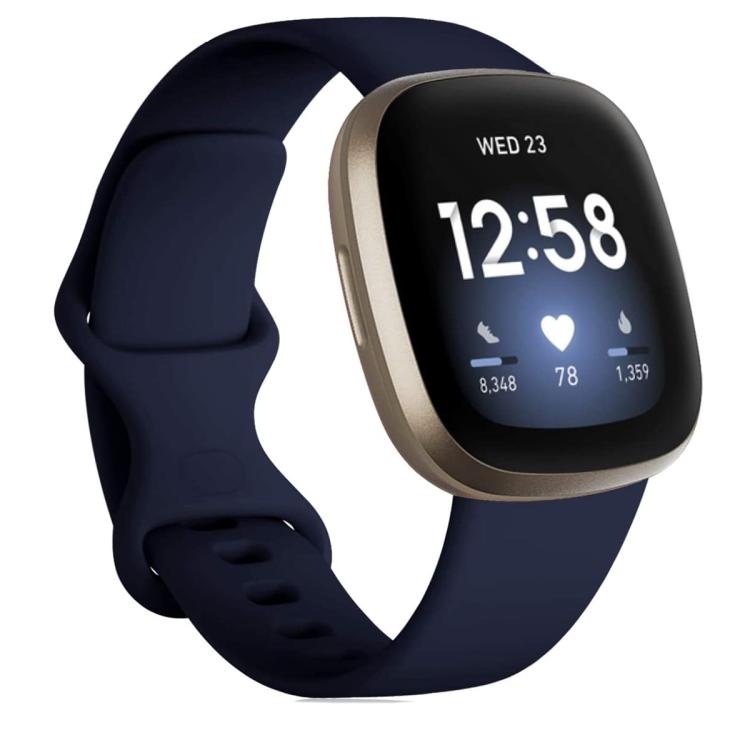 Navy silicone watch band on a smartwatch, showing the strap and adjustment holes