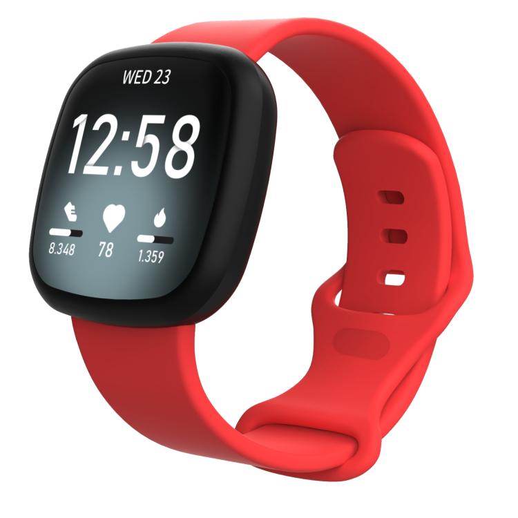 Bright red silicone watch band shown attached to a smartwatch, with an adjustable buckle.