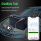 Bluetooth battery monitor tool with battery clips connected to a car battery