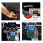 OBD2 scan tool connected to an OBDII port with 16-pin red connector
