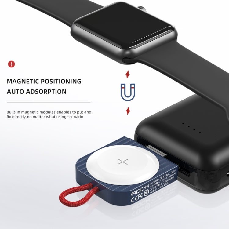 Black magnetic wireless watch charger dock with white charging puck and red braided cord