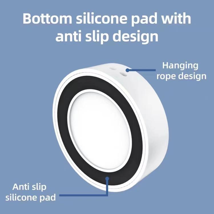 Underside of the white magnetic smartwatch charger with an anti-slip pad and hanging hole
