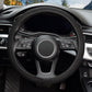 Black textured steering wheel cover with elastic anti-slip grip over steering wheel