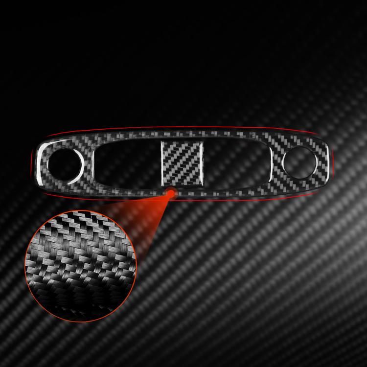 Black carbon-fiber reading light panel cover with two round holes, texture close-up inset