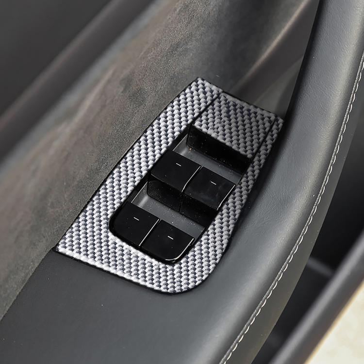 Carbon fiber patterned power window switch panel insert with four switch openings
