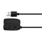 Garmin MARQ ATHLETE Gen1 clip charger showing its charging contacts and USB-A plug