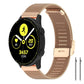 Rose gold metal mesh watch band with a buckle, shown fitted to a smartwatch