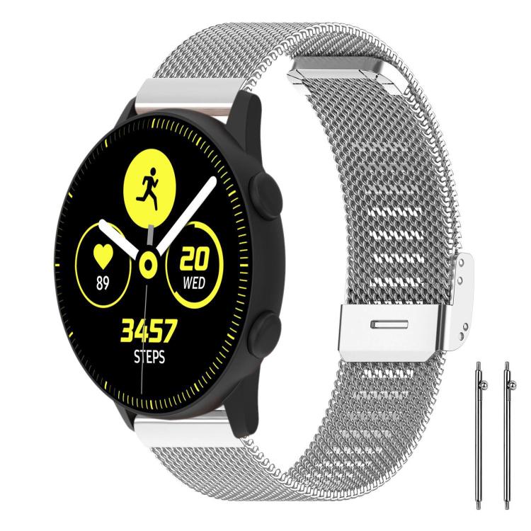 Silver metal mesh watch band with a buckle, shown fitted to a smartwatch