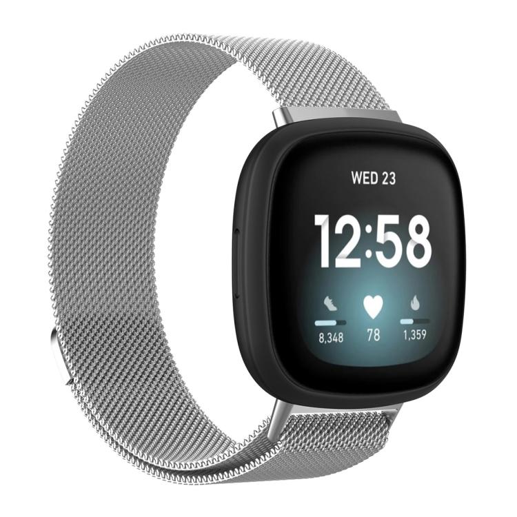 Silver Milanese metal watch band attached to a smartwatch