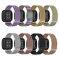 Rear view of Milanese metal magnetic watch bands in eight colors, showing their attachment ends.