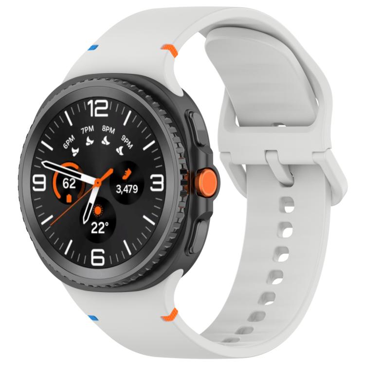 White silicone watch band with a round smartwatch