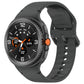 Dark gray silicone watch band with a round smartwatch