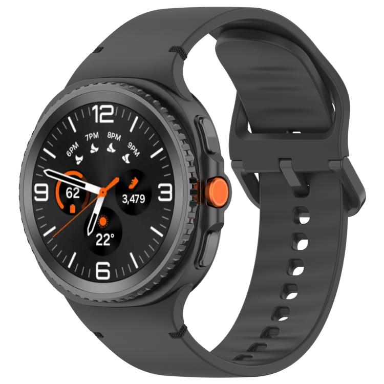 Dark gray silicone watch band with a round smartwatch