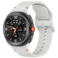 White silicone watch band with a round smartwatch
