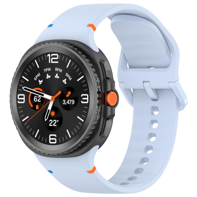 Light blue watch band shown on a round smartwatch, with a loop and adjustable sizing holes.