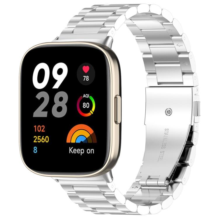 Silver three-bead stainless steel watch band fitted to a smartwatch, with folding clasp.