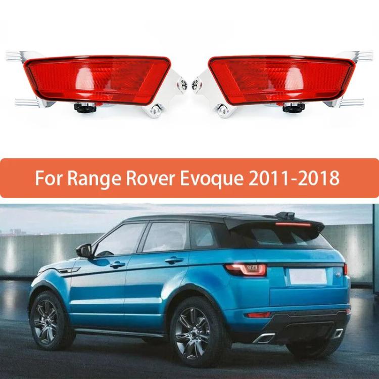 Two red rear bumper fog lights with clear lenses and mounting base