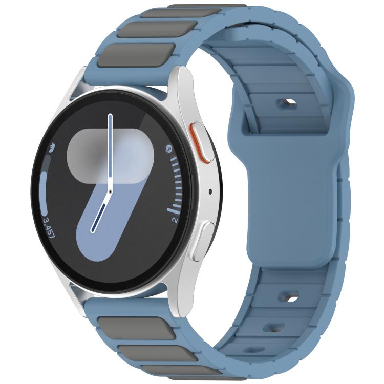 Blue gray silicone watch band with dark gray inlay panels, shown on a smartwatch.