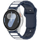 Navy silicone watch band with white inlay panels, shown on a smartwatch.