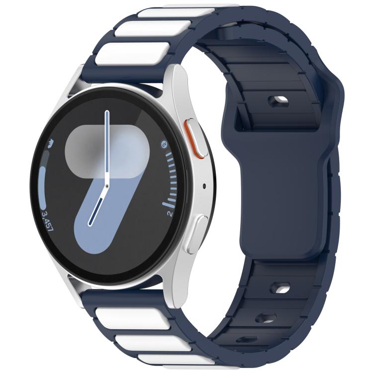 Navy silicone watch band with white inlay panels, shown on a smartwatch.