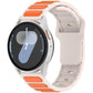 Light silicone watch band with orange inlay panels, shown on a smartwatch.