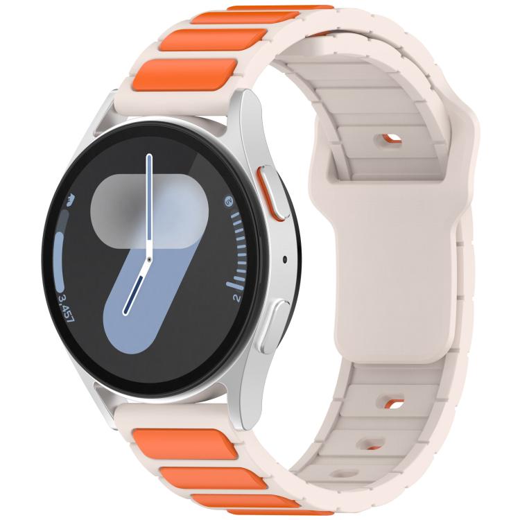Light silicone watch band with orange inlay panels, shown on a smartwatch.