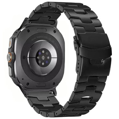 Black titanium alloy watch band with linked bracelet and folding safety buckle, shown on a watch