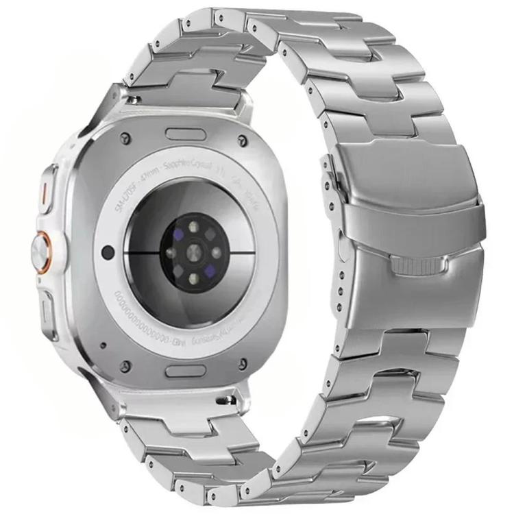Silver titanium alloy watch band with linked bracelet and folding safety buckle, shown on a watch
