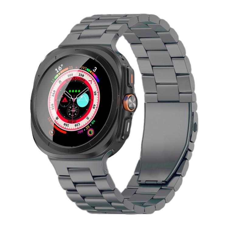 Gray linked metal watch band with flat clasp, shown fitted to a smartwatch.
