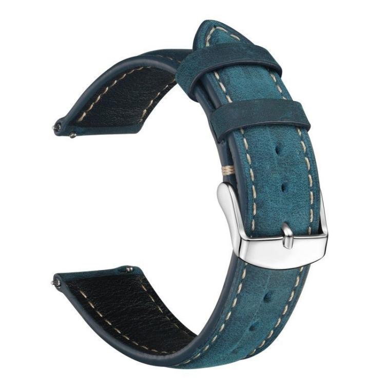 Blue leather watch band showing its buckle, keeper loops, and adjustment holes