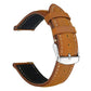 Tan leather watch band with contrast stitching, adjustment holes, and a silver buckle.