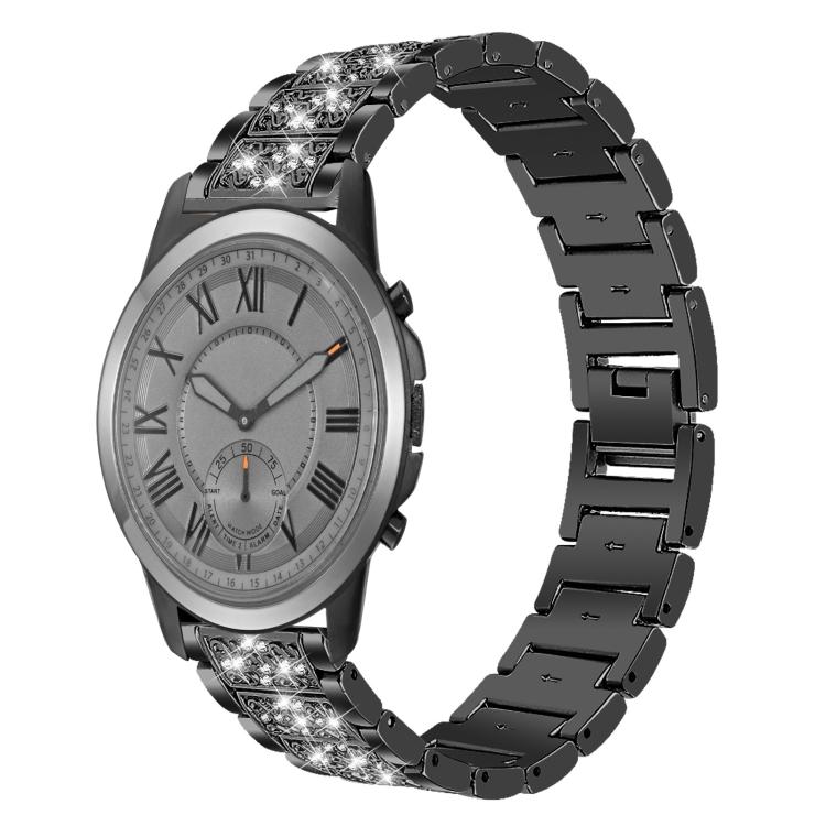 Black stainless steel watch band with sparkling stone-set links, shown on a silver-dial watch.