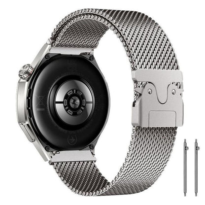 Silver stainless steel mesh watch band with raised clasp, shown attached to a watch
