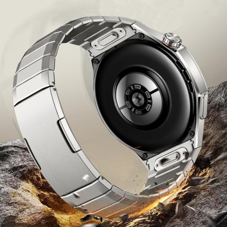 Silver titanium alloy watch band attached to a smartwatch, shown from the back.