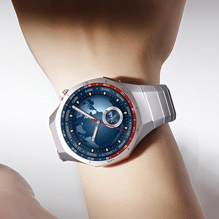 Silver titanium alloy watch band worn on a wrist, with broad segmented links.